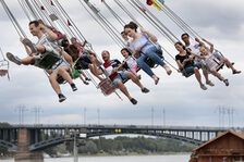 People going round in circles on the carousel